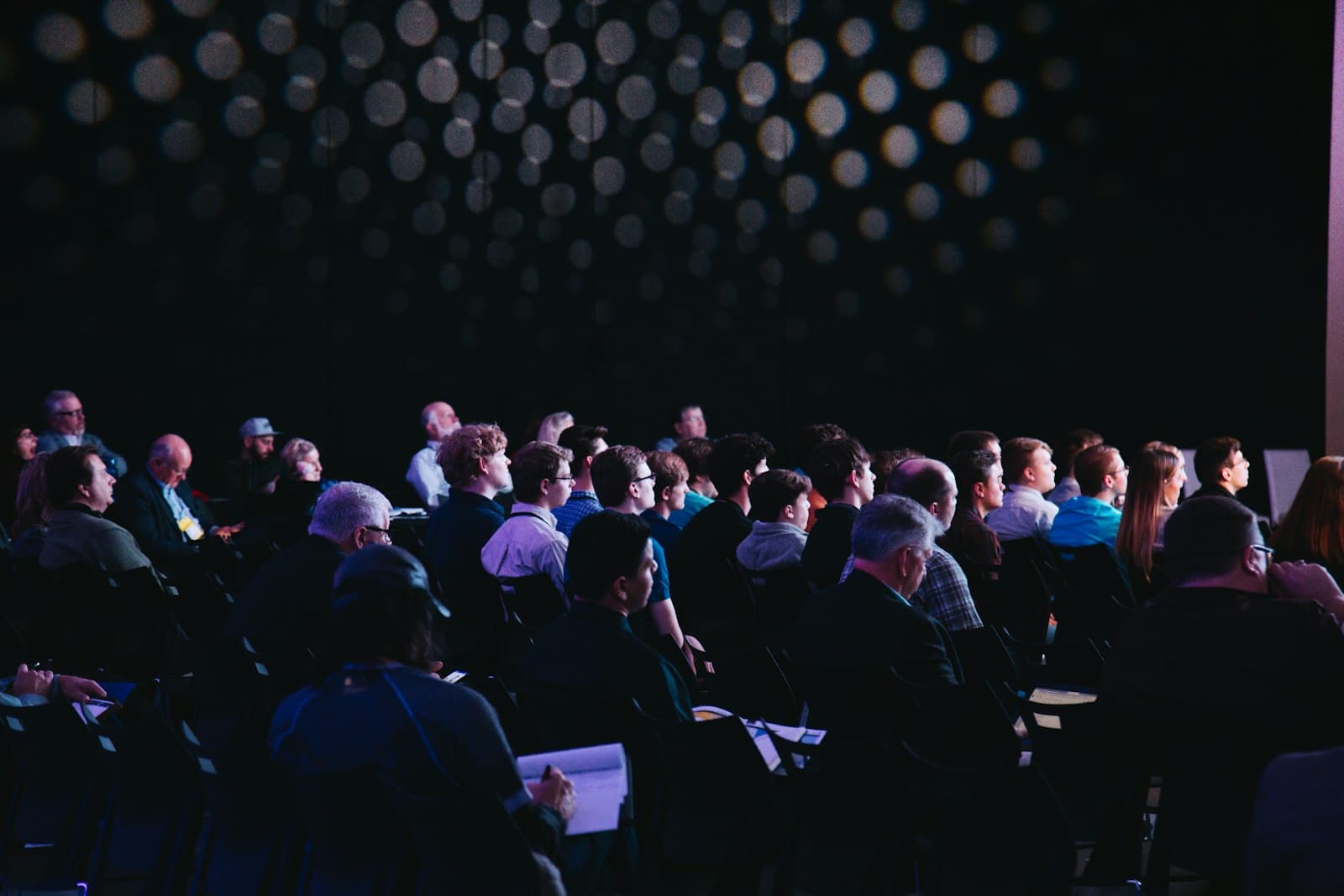 Audience seated at a tech conference event